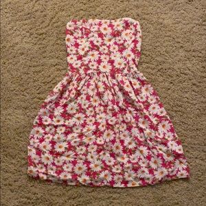 Pink dress with sunflowers on it, barley worn.